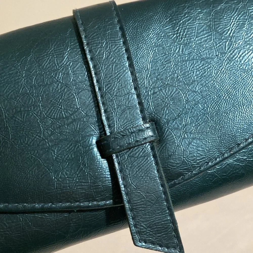 Mele & Co jewelry roll travel case teal blue